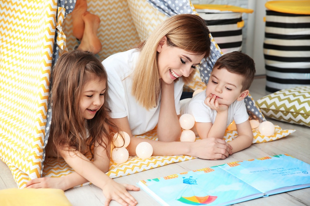 Children Reading with Nanny